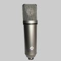 Condenser microphone on a grey background